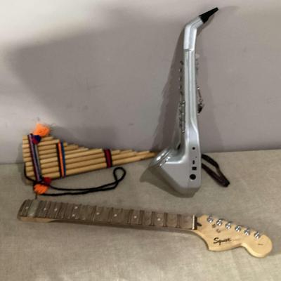 Pan Flute, Digital Horn, And Guitar Bridge