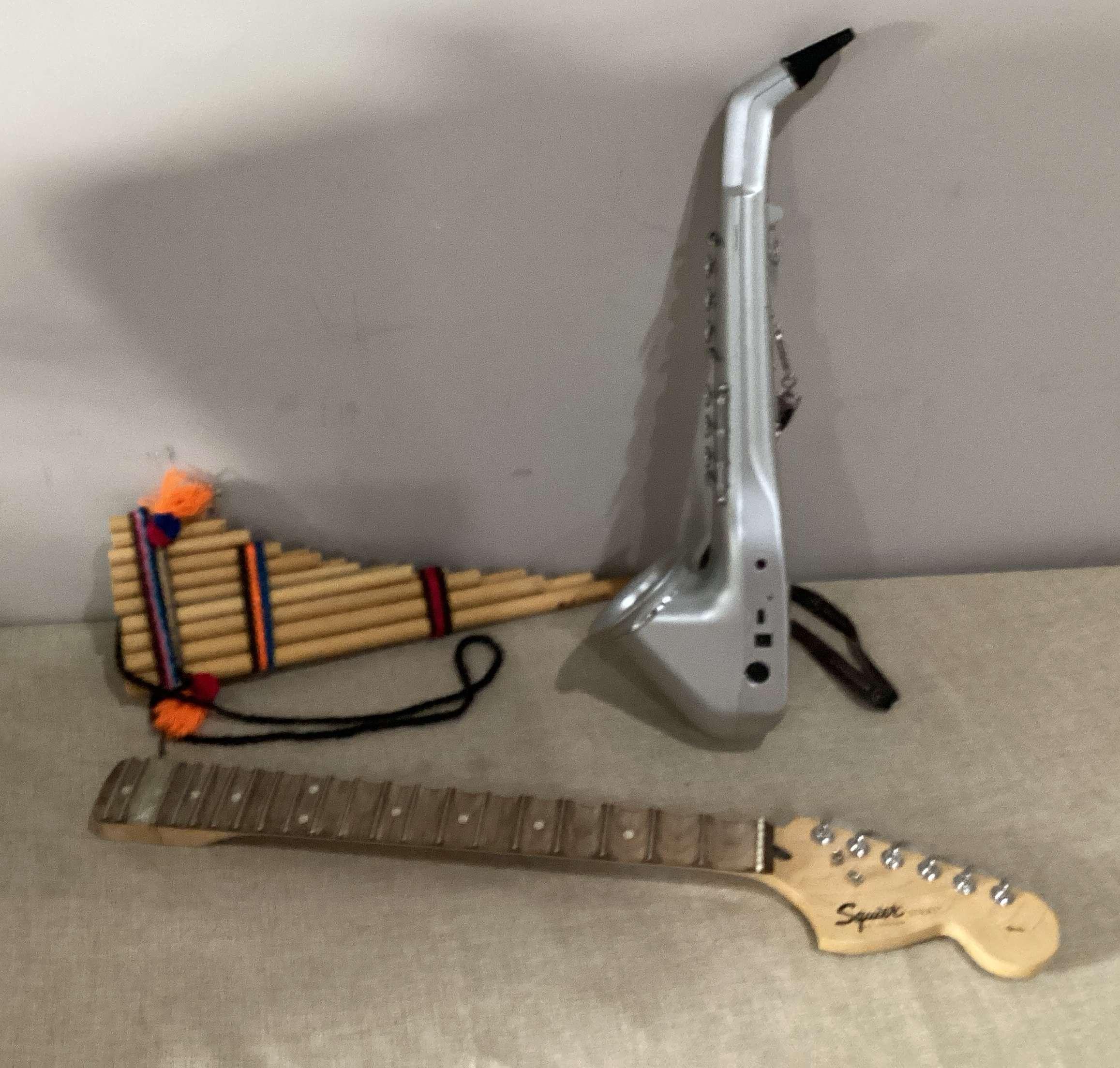 Pan Flute, Digital Horn, And Guitar Bridge