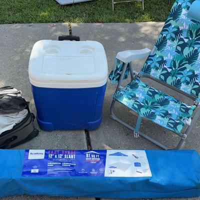 Tents, Cooler And Chair
