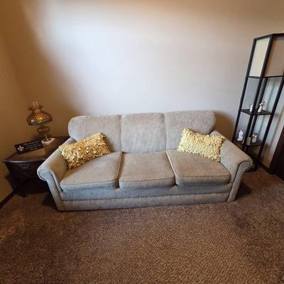 Sleeper Sofa, End Table, and Light Up Display Shelving Complete with Willow Tree Figurines
