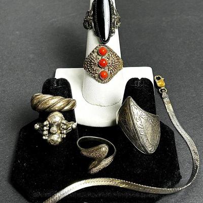 Sterling Silver Rings (6) and Bracelet (1) - Ring Size: 5, 6.5, 7, 7.5