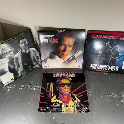 Four Arnold Schwarzenegger Laser Discs