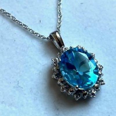 14k White Gold Necklace With Blue Stone Pendant