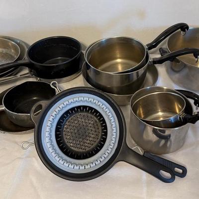 Wide Assortment Of Pans With Lids And Cookie Sheets