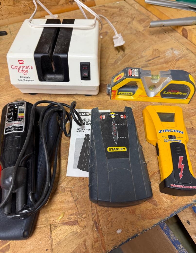 Wigginton Voltage Tester, 2 Stud Finders, Level, And Knife Sharpener