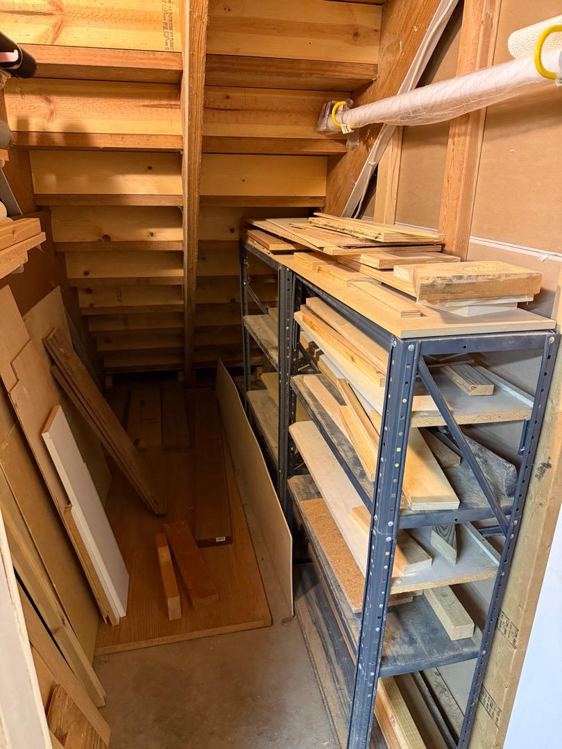 Two Metal Shelves And Wood Scraps