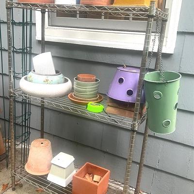 Metal Shelves With Pots 