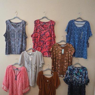 7 Women's Blouses one has a stripe patter with a design.