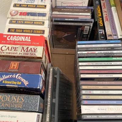 three linear feet of vhs and cds