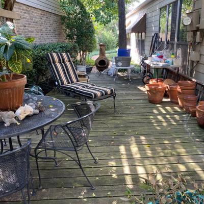 patio filled with treasures including a chimenea