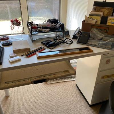 white office desk with keyboard tray