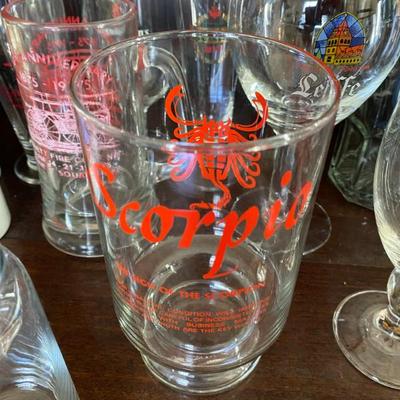 large collection of glass steins