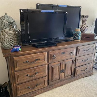 1970s dresser and several tvs