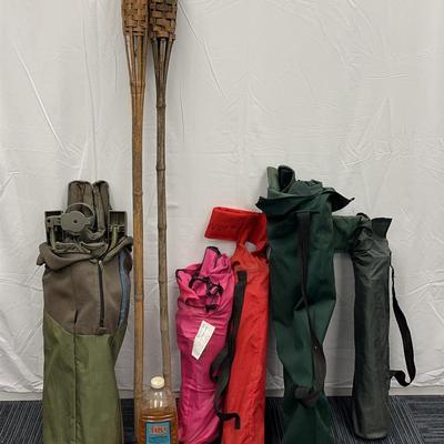 Camp Chairs And Tiki Torches For The Family
