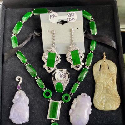 Emerald jewelry and carved lavender jade pendants