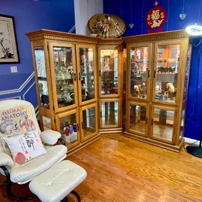 Three of the six total Amish-made Walnut Creek Furniture lighted display cabinets