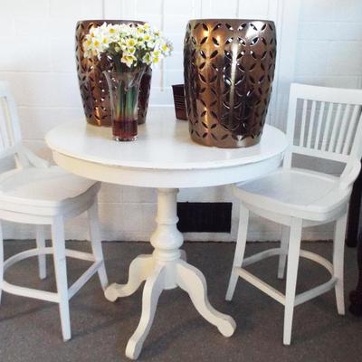 SMALL ROUND WHITE BREAKFAST TABLE AND TWO CHAIRS AND TWO GOLDEN GARDEN STOOLS