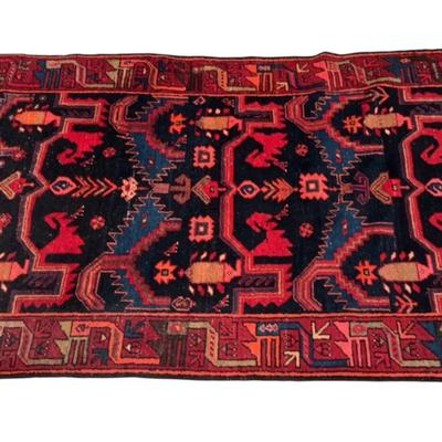 Tribal style 4x7 (approx) knotted rug