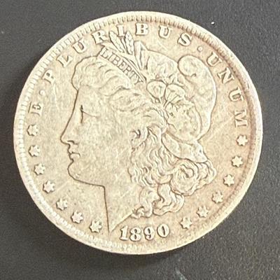 Lot 545: 1890-O Morgan Dollar
