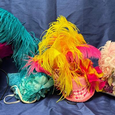 Lot 403: 4 Chiki Bird Showpiece Hats – Colorful Feather & Floral Costume Creations