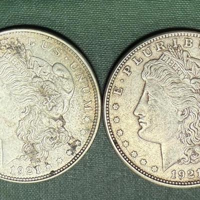 Lot 537: Two 1921 Morgan Dollars