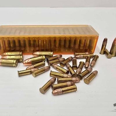 1404 • 123 rounds of .22lr and 7 rounds of 9mm ammo