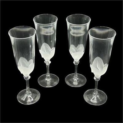 Lot 112   
Cristal D'Arques, Florence Frost Petal Champagne Flutes, Set of Four (4)