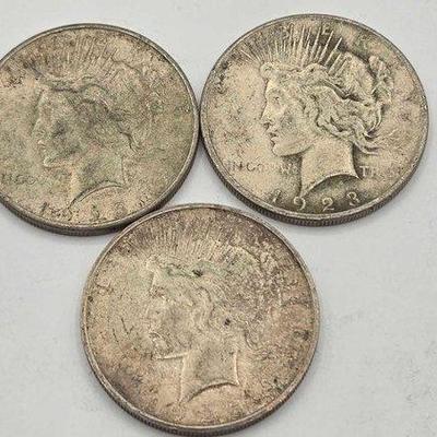 1306 • (3) silver peace dollars