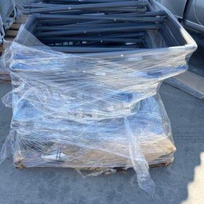 92014 • pallet of cots and standing trash cans