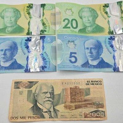 1702 • (5) foreign banknotes