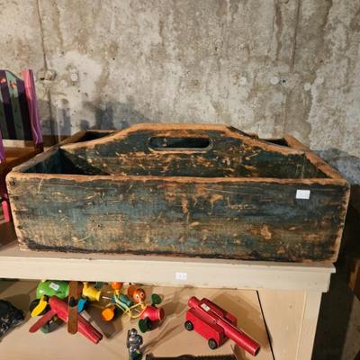 Several antique tool crates