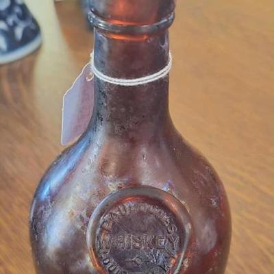 Vintage Paul Jones amber whiskey bottle