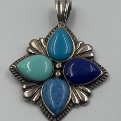 Sterling Pendant With Multihued Blue Cabs