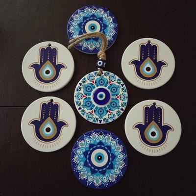 Lot #195 - Evil Eye Mandala & Hamsa Glass & Ceramic Coasters Wall Hangings Bought in Spain