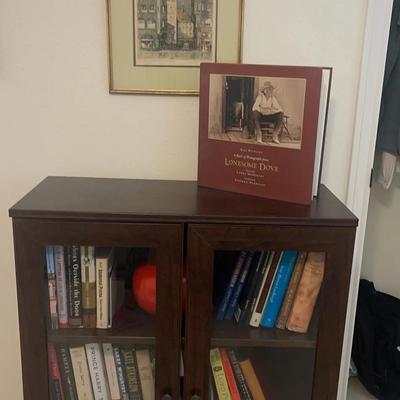 Glass Cabinet, Books And Picture by Rudolph Veit