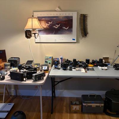 Lots of film cameras and camera repair tools, parts.