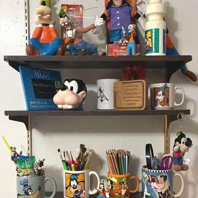 Disney Goofy Collectibles (3 Shelves) with Figures, Cups, PEZ & More