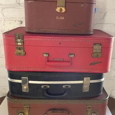 Four Vintage Suitcases 