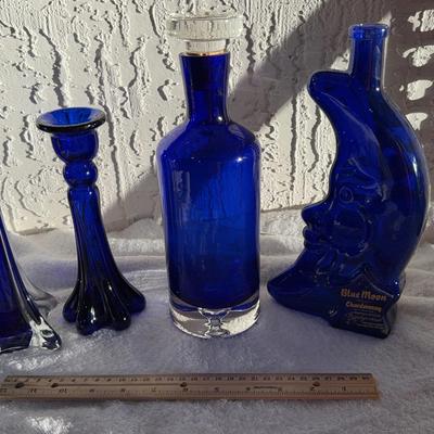 Four Pieces Of Cobalt, Blue Glassware, Bud Vase, Candlestick, Decanter, Moon Bottle