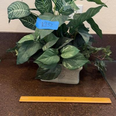 Faux Plants And Foam Container