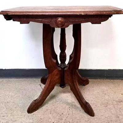 Wooden Table with Ornate Detailing