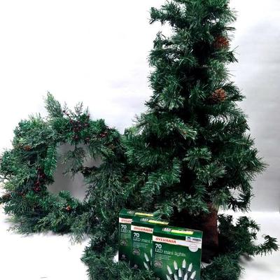 "Sylvania" lights, Pre-lit Christmas tree, and a Wreath