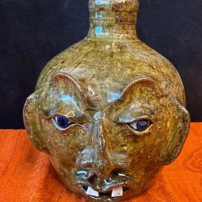 Folk art face jug
