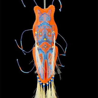 Seed bead flying fetish adorned with horse hair