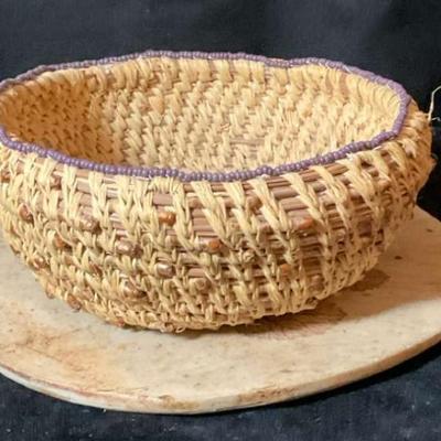 Hand woven bowl with seed bead accents on rim