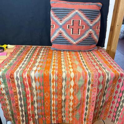 Anatolian kilim rug complementing pillow