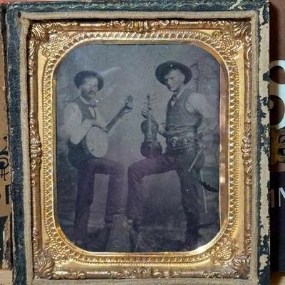 Daguerreotype of two banjo players