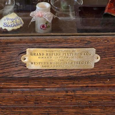 Antique cabinet by Grand Rapids Fixtures for Western Wholesale Drug Co. 