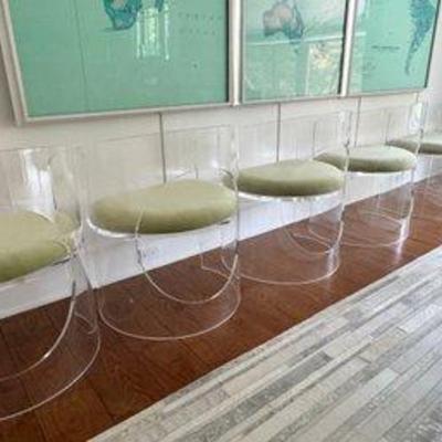 Set of 6 lovely acrylic chairs purchaed at $700 ea. 