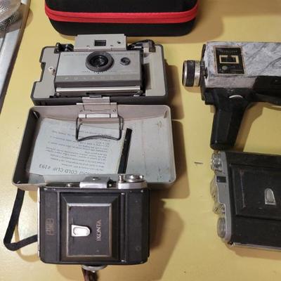 Sale Photo Thumbnail #2: Quite the collection of vintage cameras